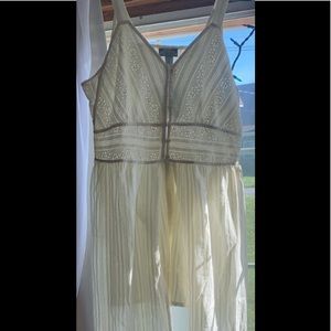 Studio West lace romper with attached train.